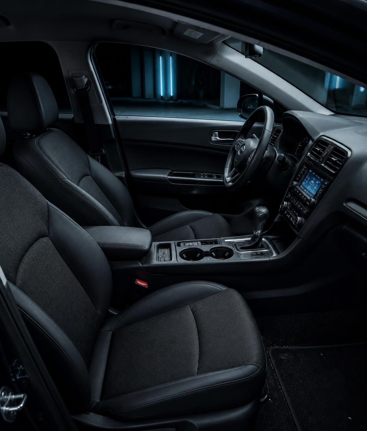 Vehicle interior with normal everyday buildup before a Grandett detailing service