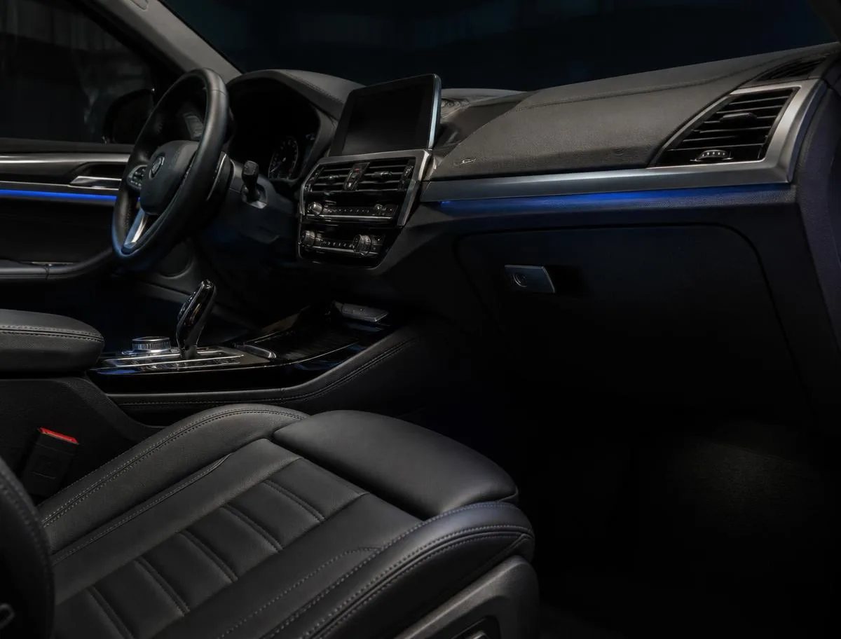 Clean modern car cabin interior with dashboard, console and seats after an Interior Mini detail