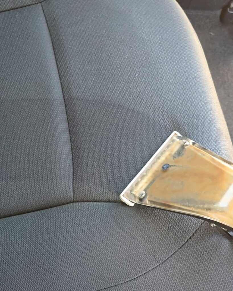 Deep interior extraction as part of Premium Interior Detail service removing embedded dirt and stains from car seats