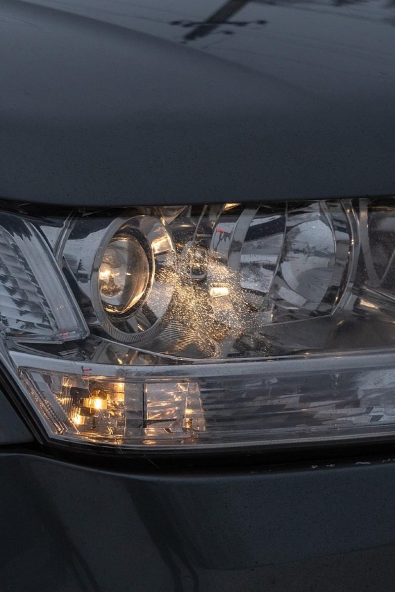 Professional headlight restoration service restoring cloudy car headlights to clear finish